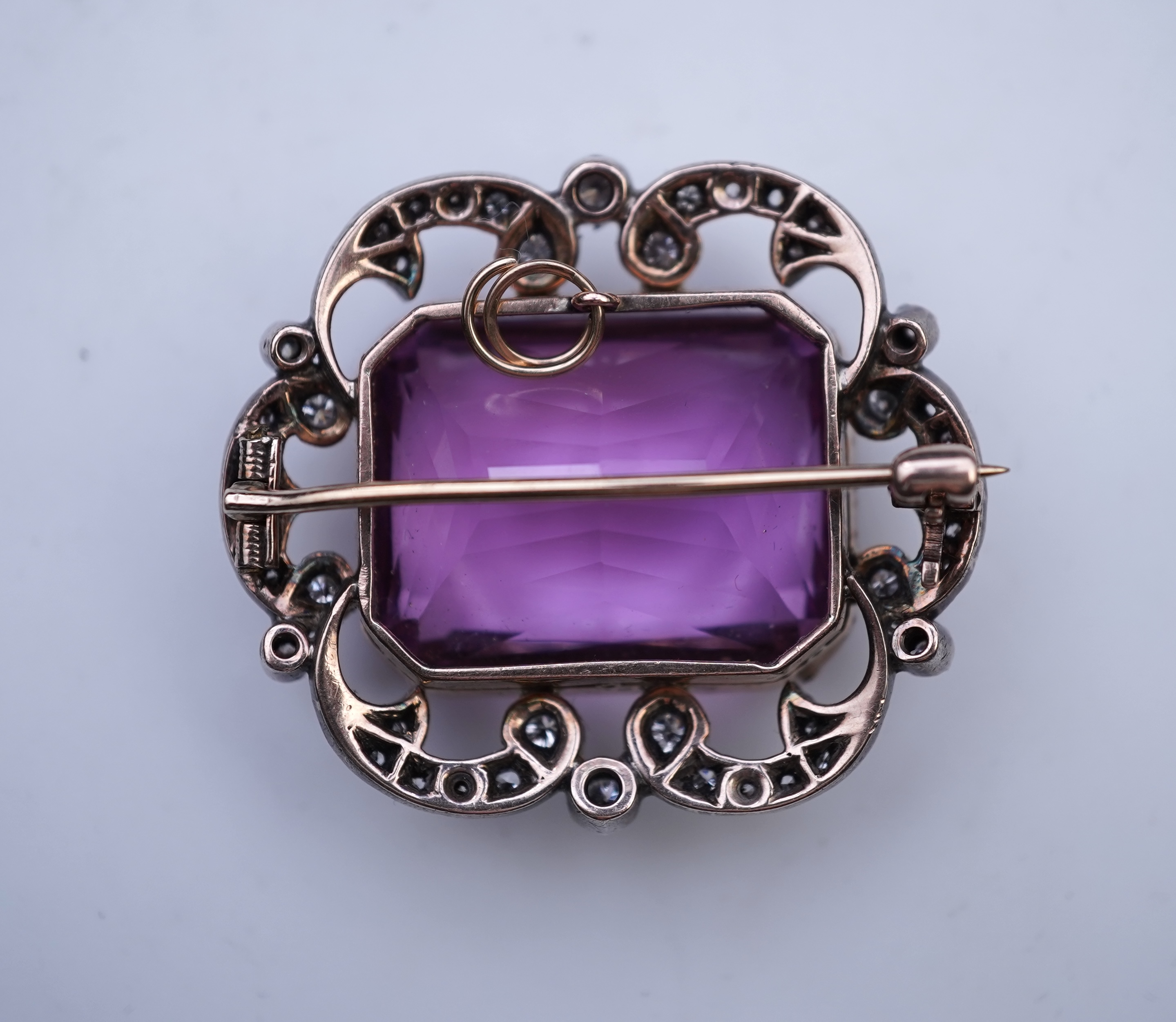 A fine kunzite and diamond brooch